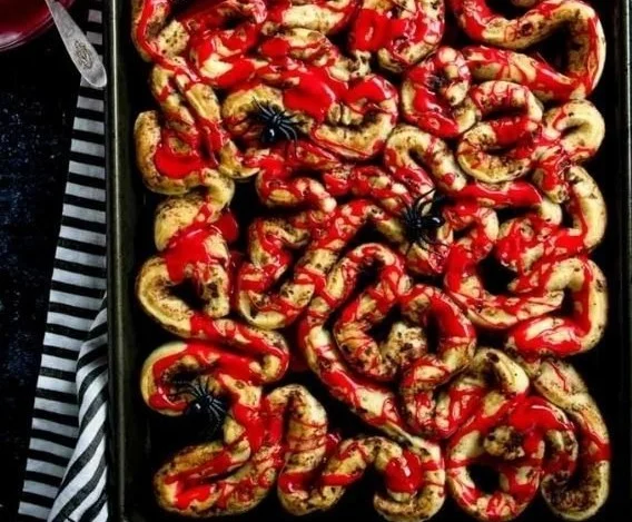 Halloween Bloody Guts Cinnamon Rolls - spooky breakfast treat recipe