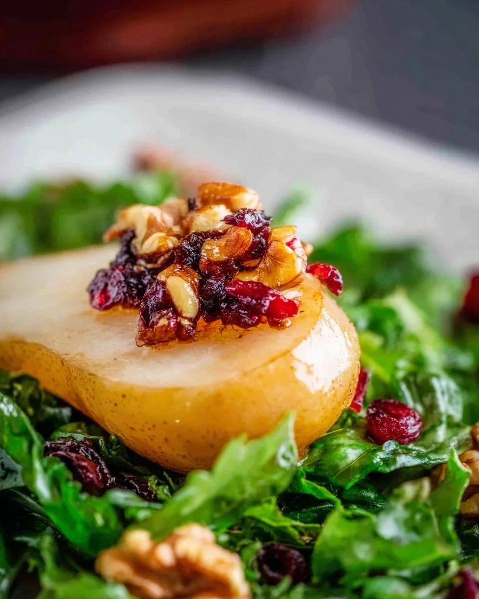 Delicious Pear and Blue Cheese Salad with greens and nuts on a plate